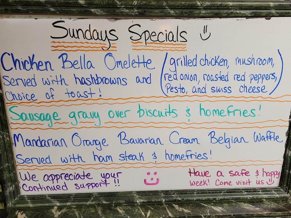 Hearty diner specials on a printed menu.